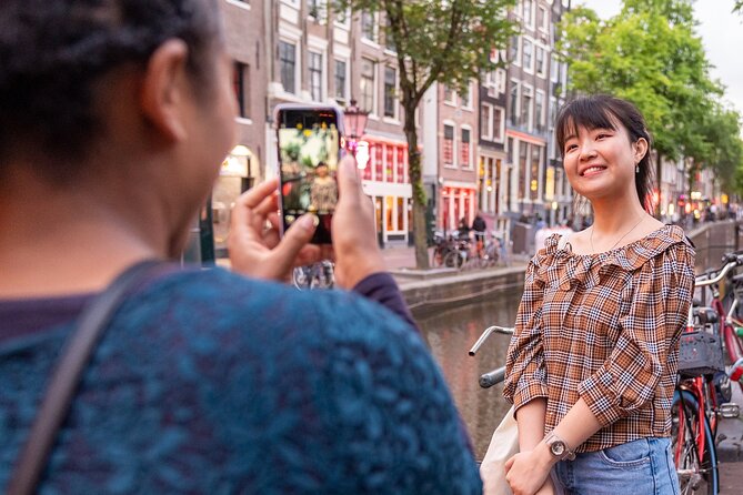 Amsterdam Red Light District Walking Tour in EN/DE/IT/ES - The Condomerie and Amsterdam’s practical approach