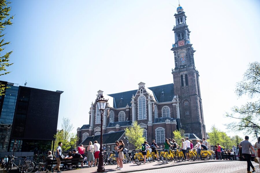 Amsterdam: Relaxed City Highlights Guided Bike Tour - Leidseplein, music, and city folklore