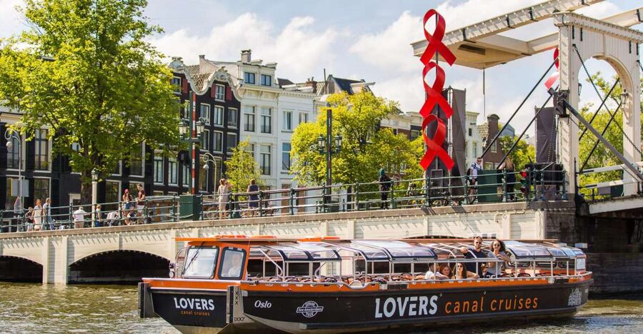 Amsterdam: Semi-Open Canal Boat Cruise - Seeing Amsterdam from its working canals