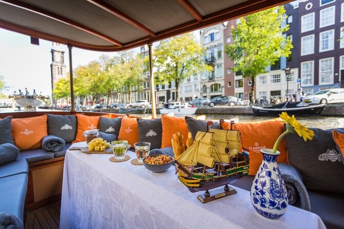 Amsterdam Small-Group Bike Tour With Canal Cruise, Drinks, Cheese - The Canal Cruise and Its Separate Dock