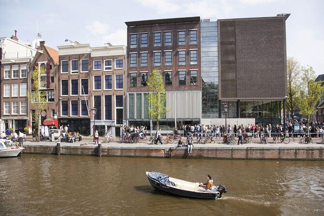 Amsterdam small-group canal cruise in 1920s saloon boat - Why the 1928 electric saloon boat matters