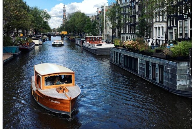 Amsterdam small-group canal cruise in 1920s saloon boat - The captain makes the difference