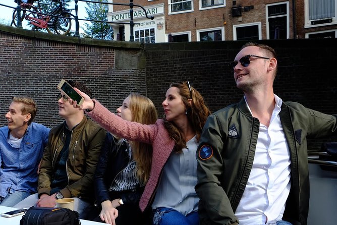 Amsterdam Small-Group Canal Cruise Including Snacks and Drinks - Why this small boat makes a difference