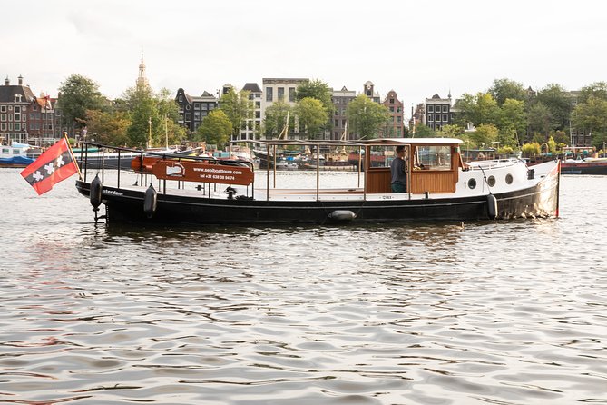 Amsterdam Small-Group Canal Cruise With Dutch Snacks and Drink - Why a small Amsterdam boat makes a difference