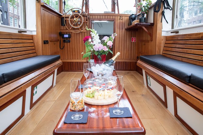 Amsterdam Small-Group Canal Cruise With Dutch Snacks and Drink - From the Amstel River to the famous bridge