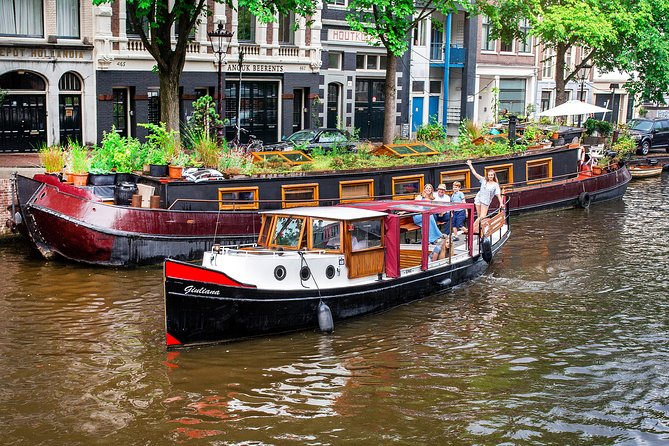 Amsterdam Small-Group Canal Cruise With Dutch Snacks and Drink - A respectful stop at Amsterdam’s LGBTQ+ monument