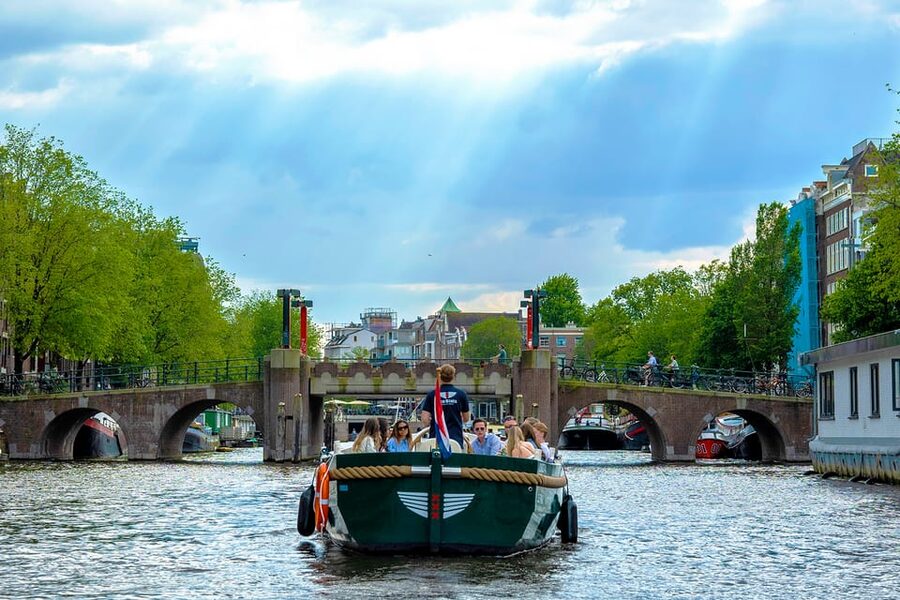 Amsterdam: The Newest Canal Cruise with Drink Option - The Amstel and the Skinny Bridge