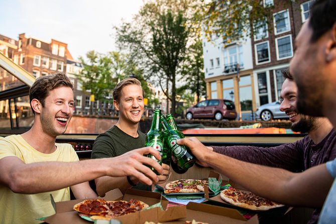 Amsterdam The Original Pizza Cruise with Unlimited Drinks - The first views: Centraal Station and the old waterfront