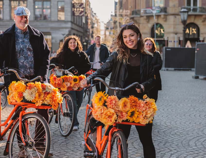 Amsterdam: Top Highlights Guided Bike Tour EN/DE/ES/FR/IT/CN - Guides, bikes, and the overall pace