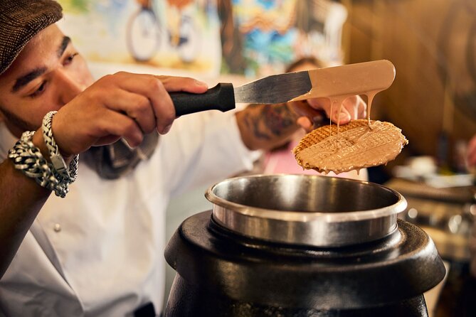 Amsterdam: Traditional Dutch Syrup Waffle Making Workshop - The best moment: eating one while it is fresh