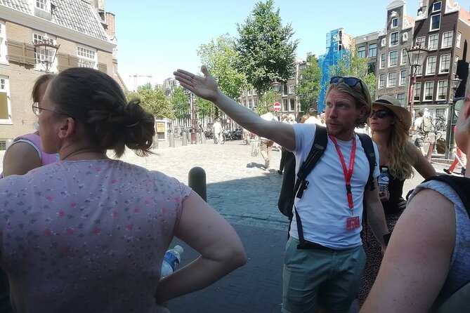 Amsterdam Walking Tour with a local comedian as guide - Grimburgwal and the Dutch way with canals and birthdays