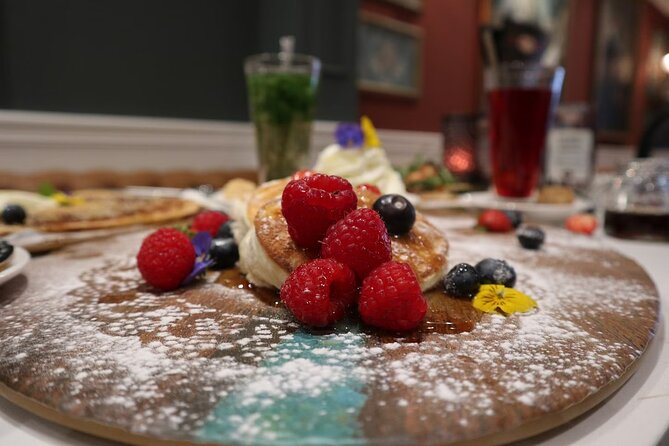 Amsterdam: Walking Tour with Dutch Pancake Lunch - Dam Square and the city’s difficult subjects