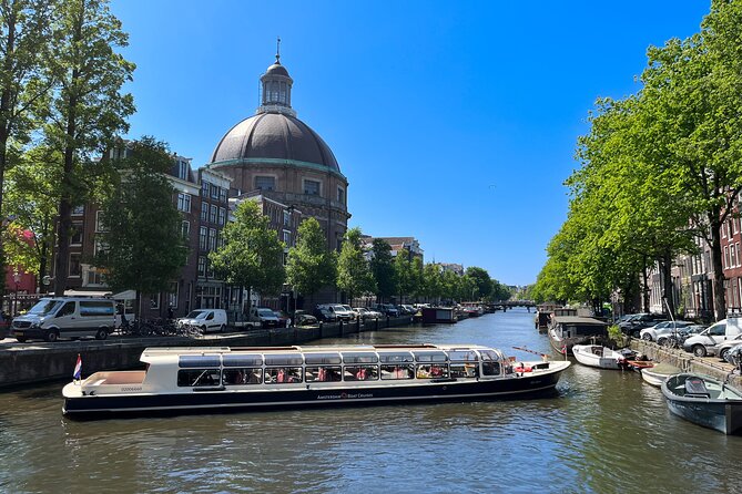 Discover Amsterdam: Luxury Canal Cruise with a Local Skipper - A broad Amsterdam view for about $16