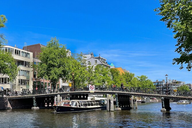 Discover Amsterdam: Luxury Canal Cruise with a Local Skipper - Crossing the IJ before entering the old canals