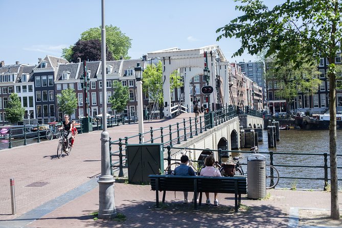 Discover Amsterdam's Culinary Scene: Morning Food Tour - Walking past the Royal Carré Theatre toward Utrechtsestraat