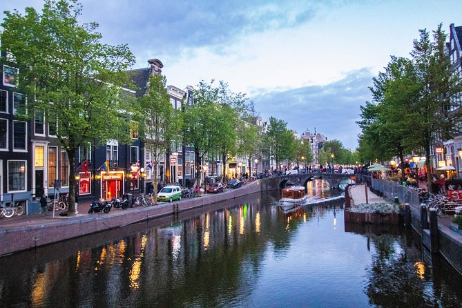 Discover the LGBT side of Amsterdam with a Local - Starting beside the water at 9 pm