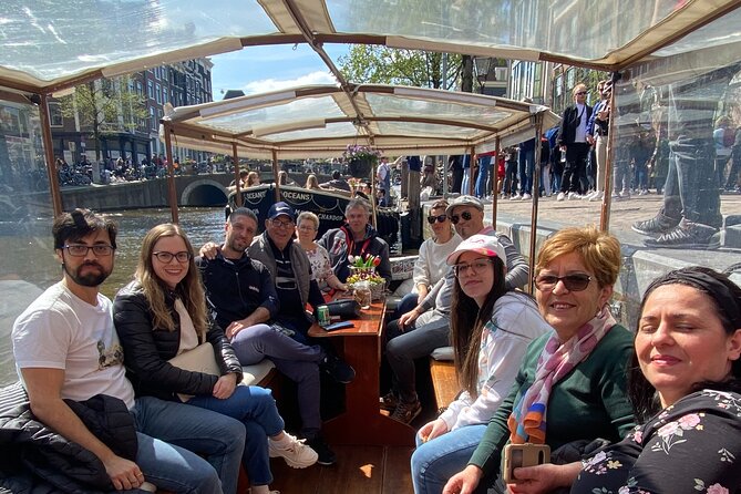 Dutch Cheese & Drinks Guided Amsterdam Boat Tour, All Inclusive - Seven Bridges, the Munttoren, and Skinny Bridge