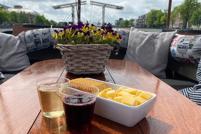Dutch Cheese & Drinks Guided Amsterdam Boat Tour, All Inclusive - Centraal Station, NEMO, and the city’s working waterfront