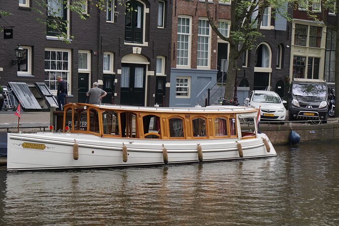 Eating Amsterdam: Food Tour & Canals Cruise - Canals, Golden Age buildings, and the old alleys