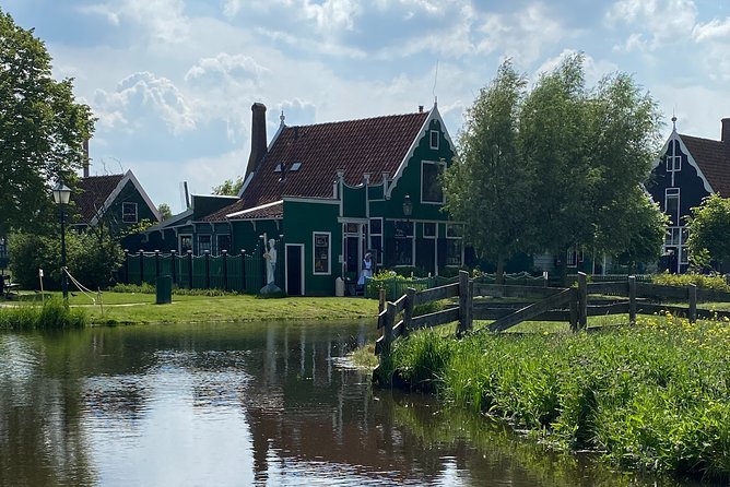 Escape Amsterdam: E-Bike to Zaanse Schans Windmills & Zaandam - Guides, safety, and the small-group advantage