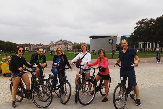 Explore Amsterdam by Bike in the Company of a French Local Guide - Vondelpark, Rijksmuseum, and Museumplein