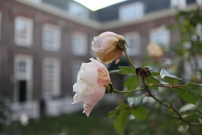 Explore hidden streets with friends - Jordaan side streets where the route earns its name