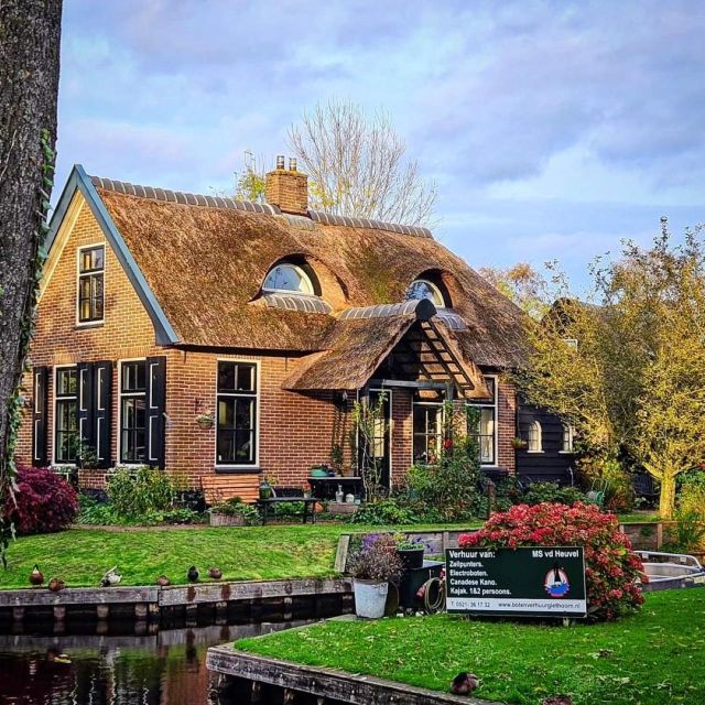 From Amsterdam: Giethoorn & Zaanse Schans Tour w/ Small Boat - Zaanse Schans: windmills, workshops, and a polished village setting