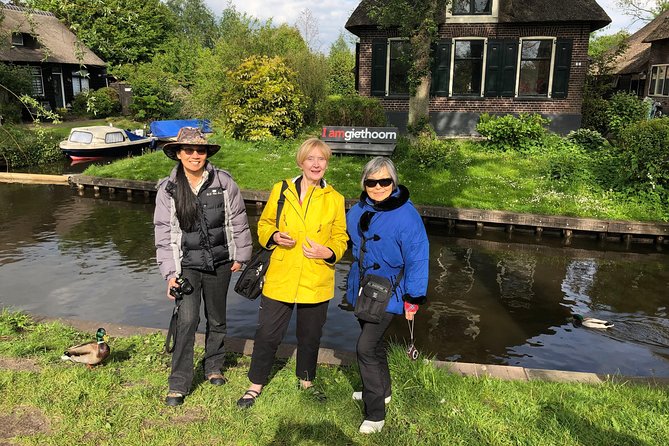 From Amsterdam: Zaanse Schans, Volendam, Giethoorn with Boat Tour - Giethoorn: canals, bridges, and a one-hour boat ride