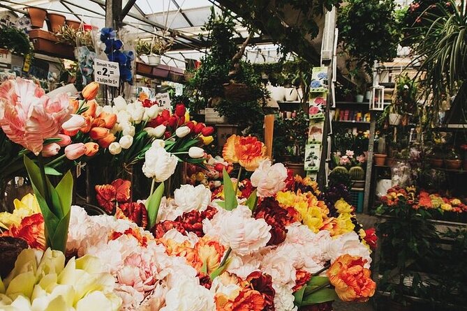 Full-Day Trip From Amsterdam to Keukenhof, Zaanse Schans + Cruise - Keukenhof and the flower fields near Lisse