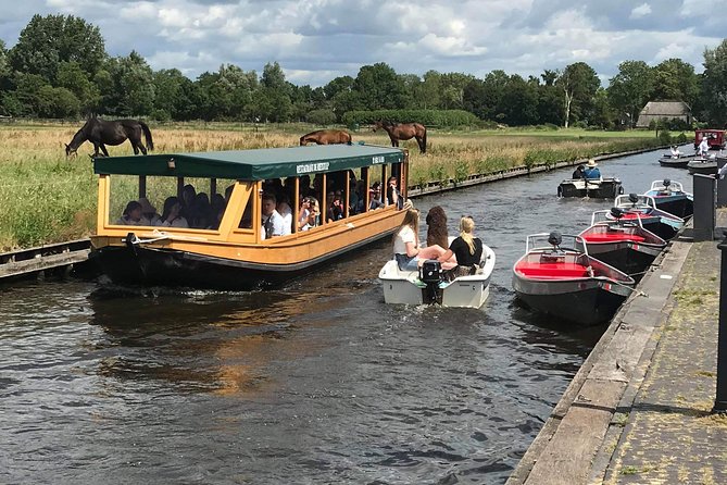 Giethoorn, Zaanse Schans Windmills Guided Day Trip from Amsterdam - The guides are a major part of the value