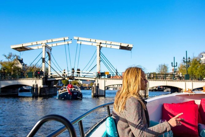 Guided Amsterdam Canal Cruise – Snacks & Drinks on board(1 Hour) - From maritime power to modern Amsterdam