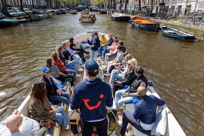 Highlights and Local Insights Canal Cruise Tour in Amsterdam - Finishing Under the Magere Brug