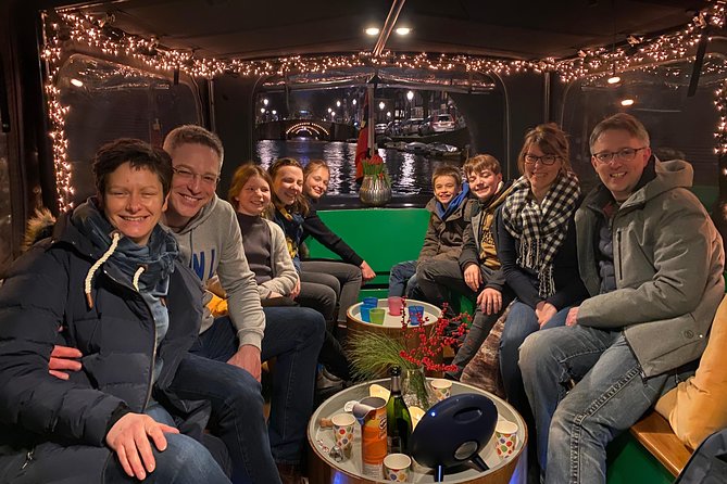 Light Event Amsterdam by small boat, 8 passengers max! You won't find any better - Seeing Amsterdam’s Light Festival from the canal