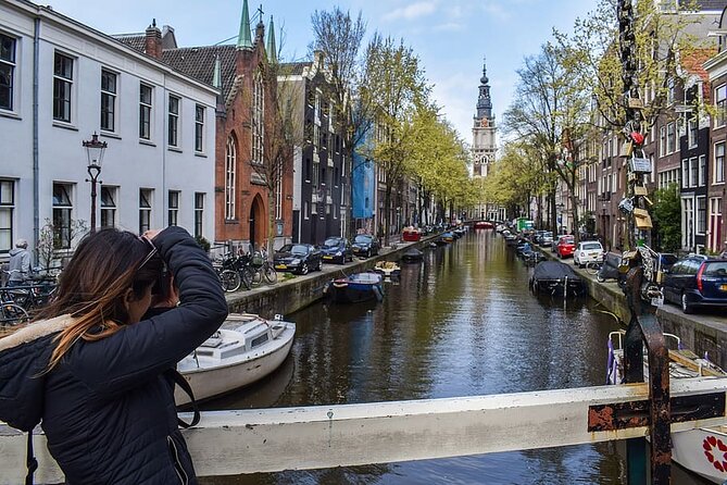Private Amsterdam City Highlights Bike Tour (PRIVATE GUIDE) - Local stories instead of a simple ride