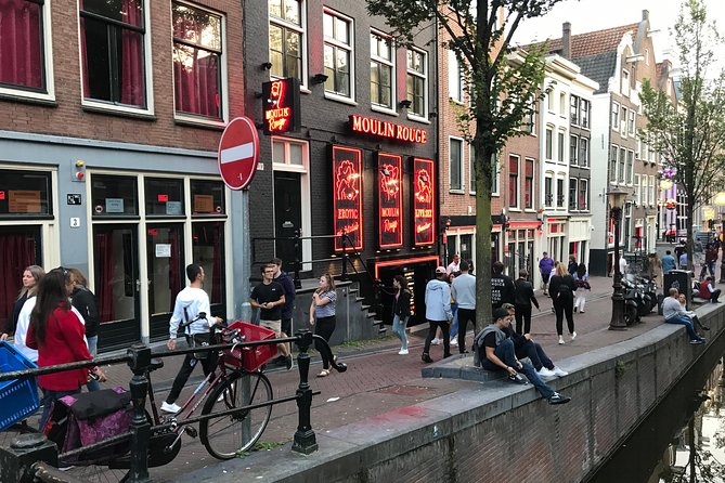 Private Amsterdam Red Light District and Coffee Shop Tour - Understanding prostitution and coffee shop culture