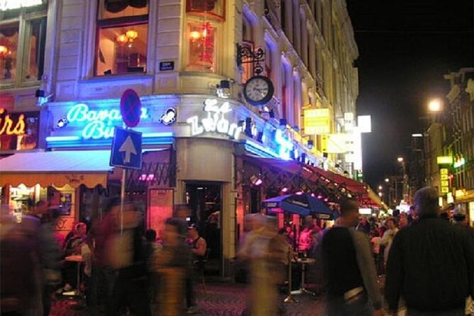Private Amsterdam Red Light District and Coffee Shop Tour - Starting on Damrak and the wooden city beneath your feet