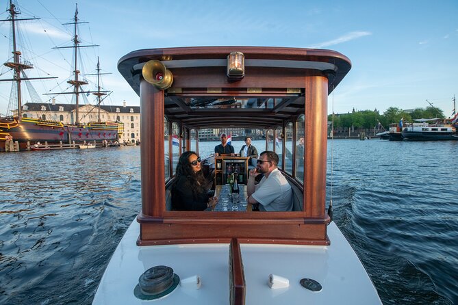 Private Boat Tour Amsterdam - 90 Min incl. welcome drink on historic saloon boat - Boarding at Oosterdokskade 8