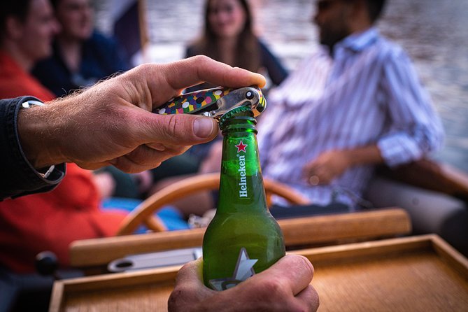 Private Boat Tour Amsterdam - 90 Min incl. welcome drink on historic saloon boat - The guides make the difference