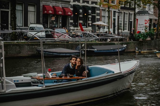 Private Romantic Canal Cruise Amsterdam with Bubbly and Snacks - Monet’s Bridge of Love and the old harbor tower