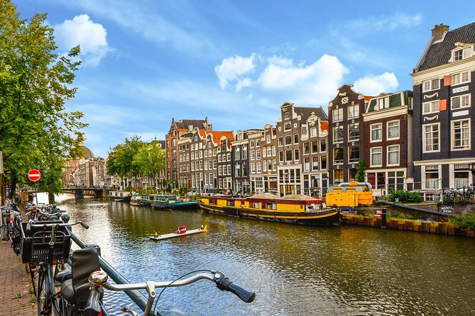 Private Tour: Amsterdam City Walking Tour and Canal Cruise - Amsterdam in Three Hours, From Dam Square to the Canals