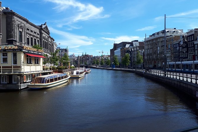 Private Tour: Amsterdam City Walking Tour and Canal Cruise - Albert Cuyp Market and a Taste of Daily Amsterdam