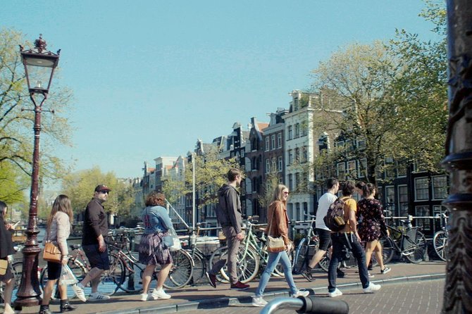 Private Tour: Amsterdam's City Highlights and Hidden Gems - Begijnhof and Dam Square: quiet courtyard, public heart