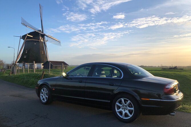 Private Tour Zaanse Schans Windmills and Volendam in Jaguar - A quick photo at Magere Brug