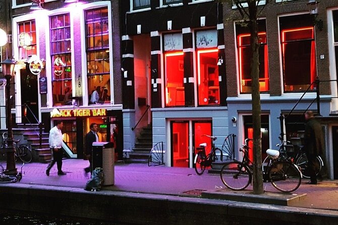 Red Light District Primetime Private Tour for 18+ Only - Oude Kerk beside the windows
