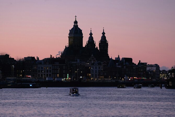 Red Light District Tour - It's History & It's Future - St. Nicholas Basilica brings a grand landmark into view