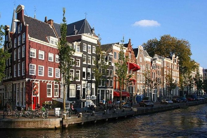 Secrets of Amsterdam Walking Tour plus Dutch Sweets Tasting - Nieuwmarkt, De Waag, and Rembrandt’s connection