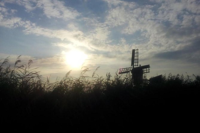 Small-Group Guided Sunset Canoe Tour in Waterland with Dinner - Group size, transport, and practical value