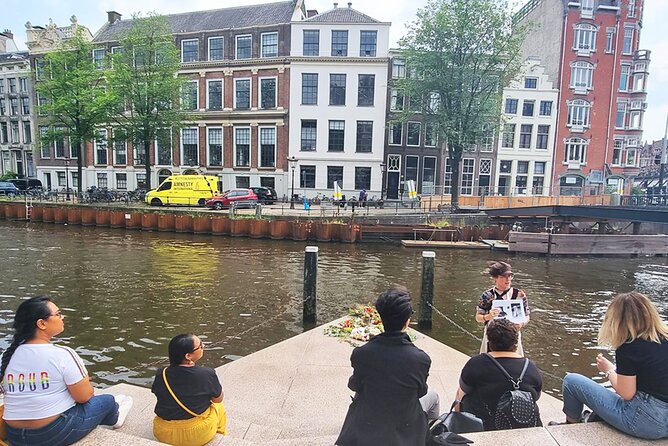 Small Group LGBTQ+ History Tour in Amsterdam - Munt Tower: one shopkeeper against state violence