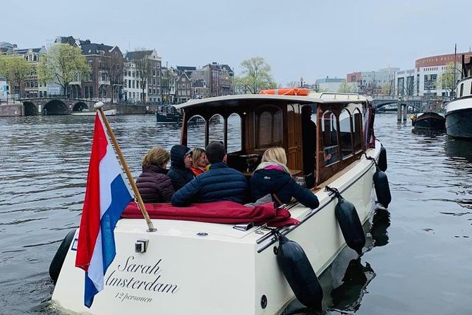 Small-Group Luxury Canal Cruise with Local Skipper - Meeting the Anne Frank House from the water