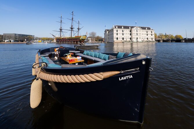 Small-Group Luxury Canal Cruise with Local Skipper - A romantic bridge and the crooked houses by the Amstel
